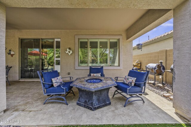 43650 W Snow Dr, Maricopa, AZ 85138 - view of patio / terrace featuring an outdoor fire pit and fence