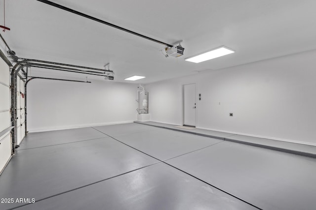 garage featuring a garage door opener and gas water heater
