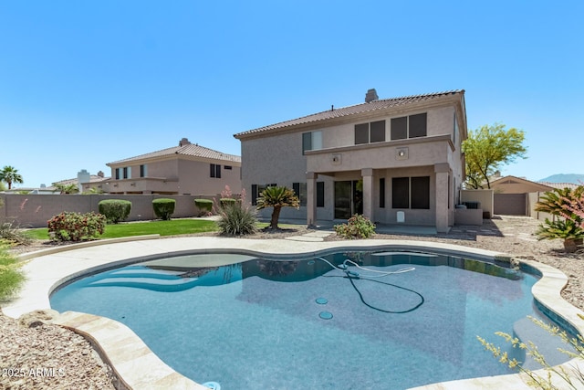view of swimming pool featuring a fenced backyard and a fenced in pool