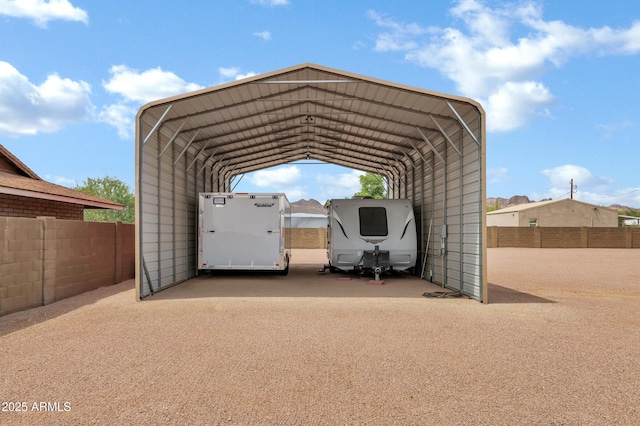 2926 W Smoketree St, Apache Junction, AZ 85120 - view of parking / parking lot featuring a detached carport and driveway