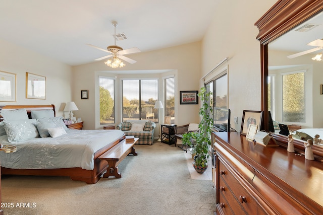 bedroom featuring ceiling fan and light colored carpet