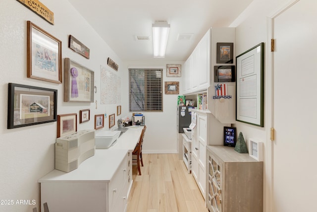 hallway featuring light wood-type flooring