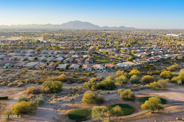 birds eye view of property featuring a mountain view