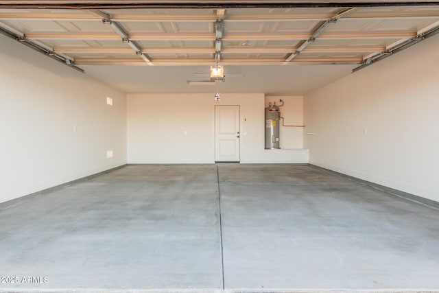 garage with a garage door opener and water heater