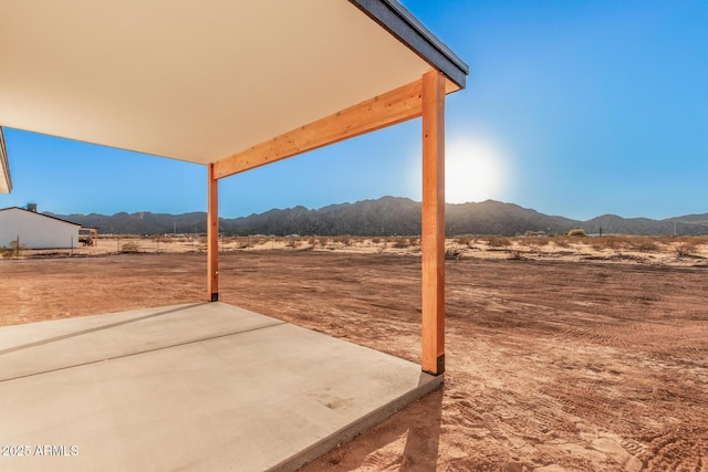 view of patio featuring a mountain view