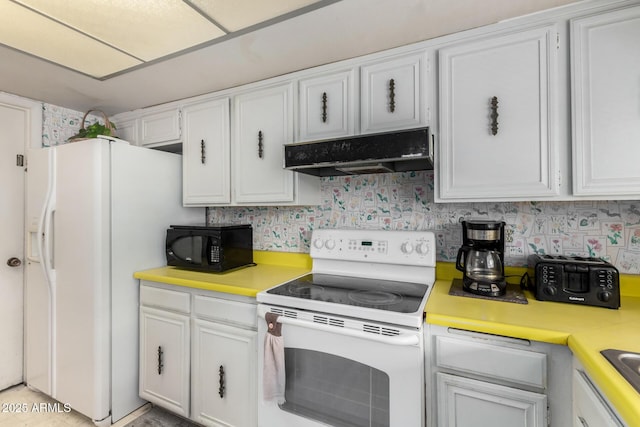 kitchen featuring light countertops, white appliances, white cabinets, and under cabinet range hood