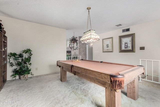 recreation room with billiards, visible vents, a textured ceiling, and light colored carpet