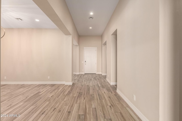 corridor featuring light hardwood / wood-style flooring