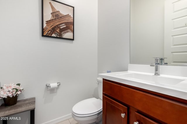 4044 E Dawson Dr E, Chandler, AZ 85249 - half bathroom featuring toilet, vanity, tile patterned flooring, and baseboards