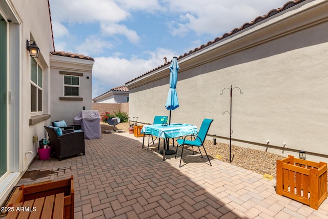 4044 E Dawson Dr E, Chandler, AZ 85249 - view of patio / terrace with a grill, outdoor dining area, and fence