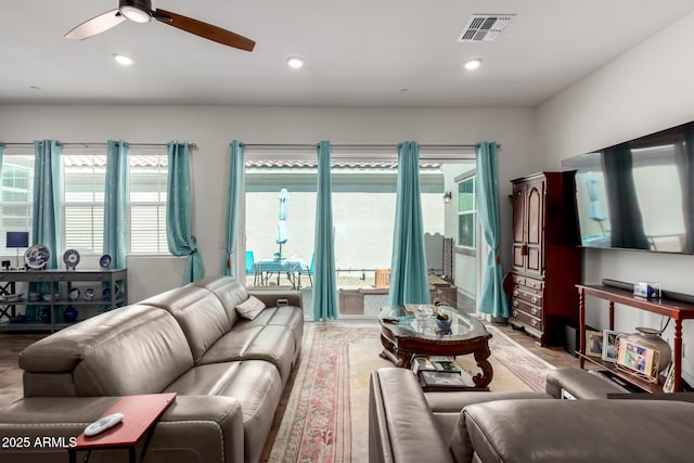 4044 E Dawson Dr E, Chandler, AZ 85249 - living area with ceiling fan, wood finished floors, and recessed lighting