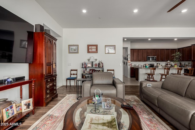 4044 E Dawson Dr E, Chandler, AZ 85249 - living room with light wood-style floors, recessed lighting, and a ceiling fan
