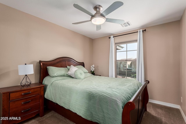 bedroom featuring visible vents, baseboards, a ceiling fan, and carpet flooring