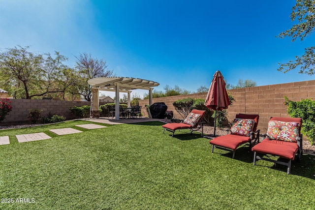 view of yard with a patio area, a pergola, and a fenced backyard