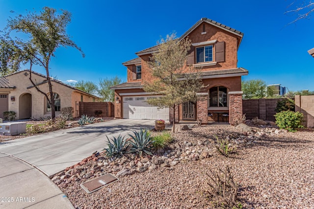 mediterranean / spanish-style home with fence, driveway, stucco siding, a garage, and brick siding