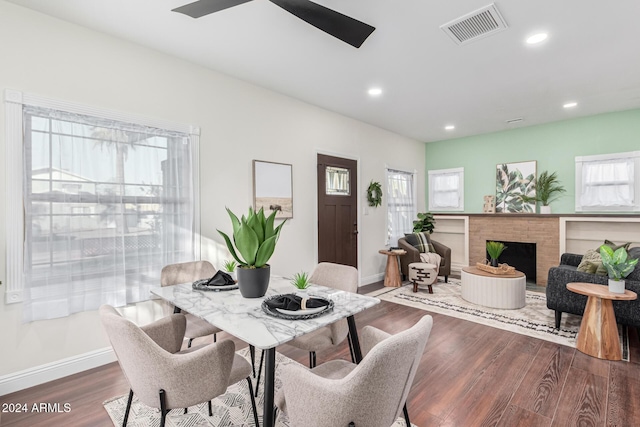 dining space with hardwood / wood-style flooring, plenty of natural light, and ceiling fan