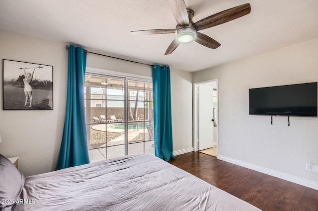 bedroom featuring access to exterior, ceiling fan, and dark wood-type flooring