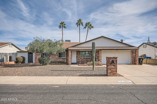 ranch-style home featuring a garage