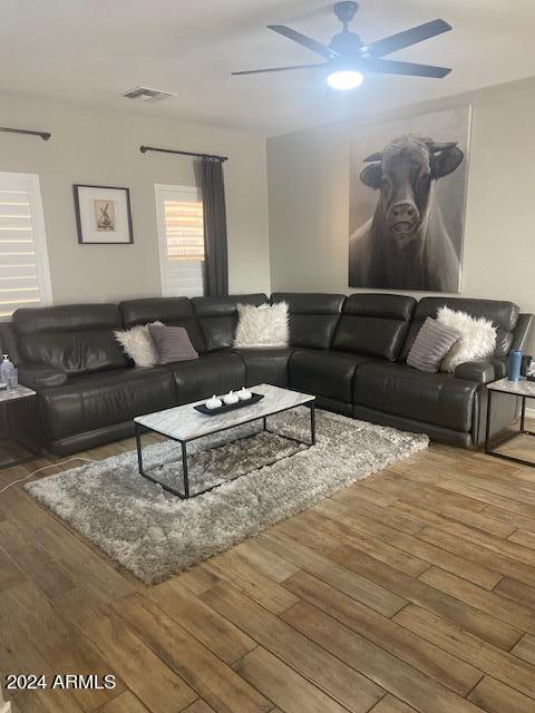 living room with wood-type flooring