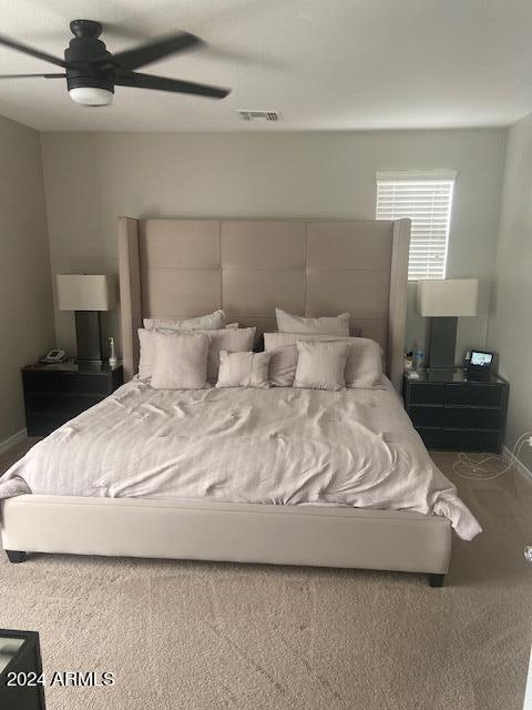 bedroom featuring carpet and ceiling fan