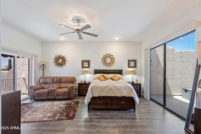 bedroom with a ceiling fan, access to exterior, wood finished floors, and a closet