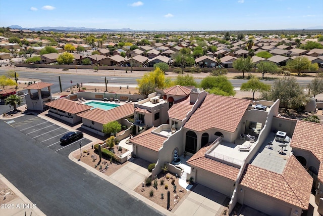 birds eye view of property with a residential view