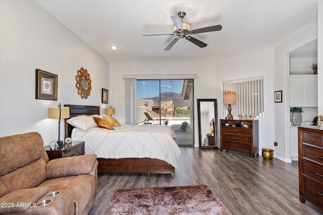 bedroom featuring access to outside, ceiling fan, and dark wood-style floors