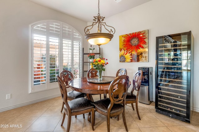 tiled dining room with beverage cooler