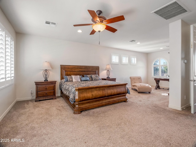 carpeted bedroom with ceiling fan