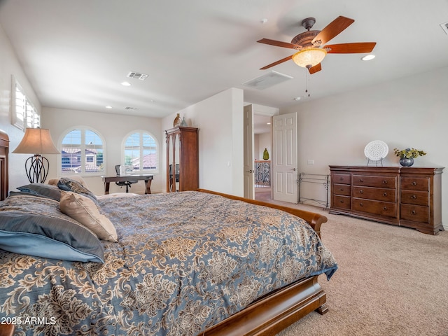 bedroom featuring ceiling fan and light colored carpet