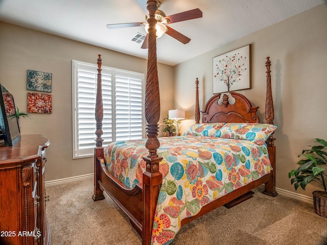 bedroom with ceiling fan and light carpet