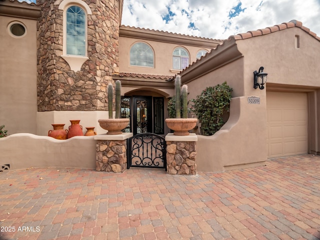 property entrance featuring a garage