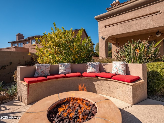 view of patio with an outdoor fire pit