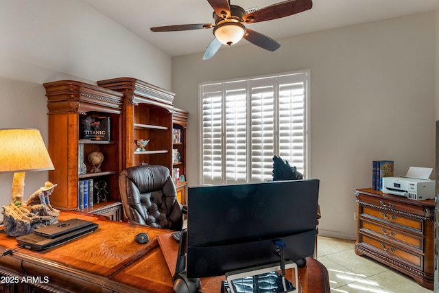 office featuring ceiling fan and light tile patterned floors