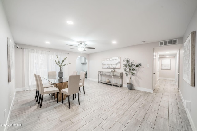 dining room with visible vents, baseboards, ceiling fan, recessed lighting, and light wood-style floors