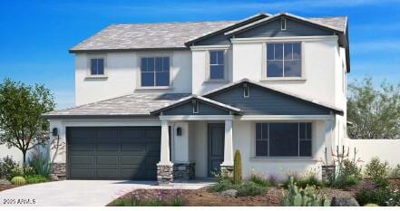 view of front of home with a garage