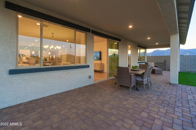 view of patio / terrace featuring a mountain view