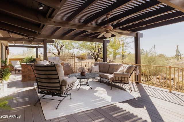 wooden terrace with a pergola, outdoor lounge area, and ceiling fan