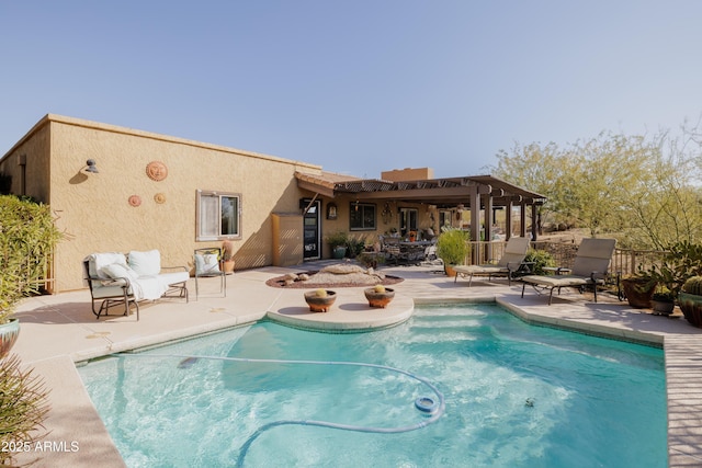 view of swimming pool featuring a patio