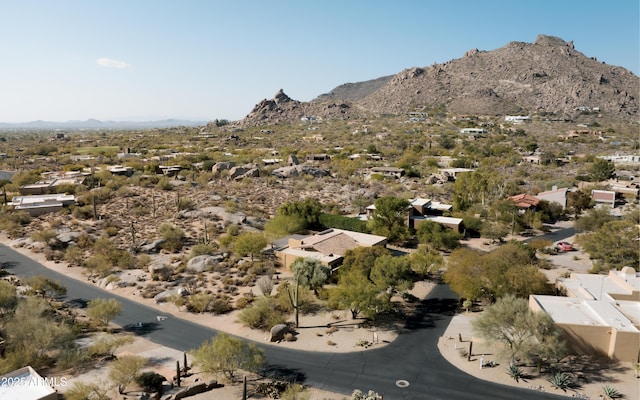 birds eye view of property featuring a mountain view