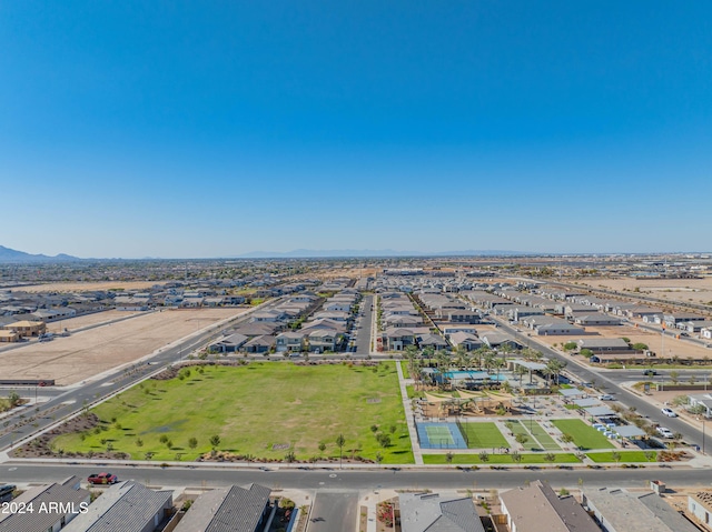 birds eye view of property with a mountain view