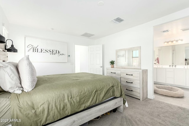 4110 S 58th Ln, Phoenix, AZ 85043 - bedroom with visible vents and ensuite bathroom
