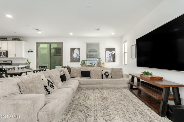 4110 S 58th Ln, Phoenix, AZ 85043 - living area with recessed lighting, visible vents, and a wealth of natural light