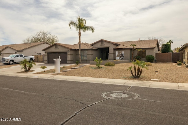 ranch-style house featuring a garage