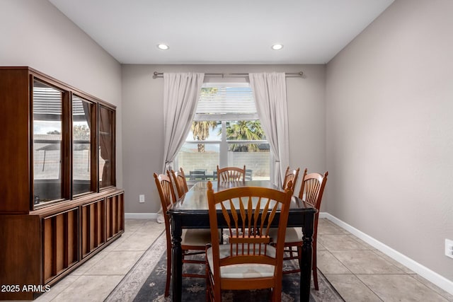 dining space with light tile patterned floors, recessed lighting, and baseboards