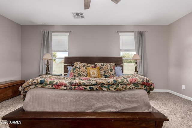 bedroom with visible vents, ceiling fan, baseboards, and carpet floors