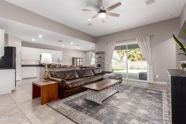 living room with recessed lighting, visible vents, ceiling fan, and light tile patterned flooring