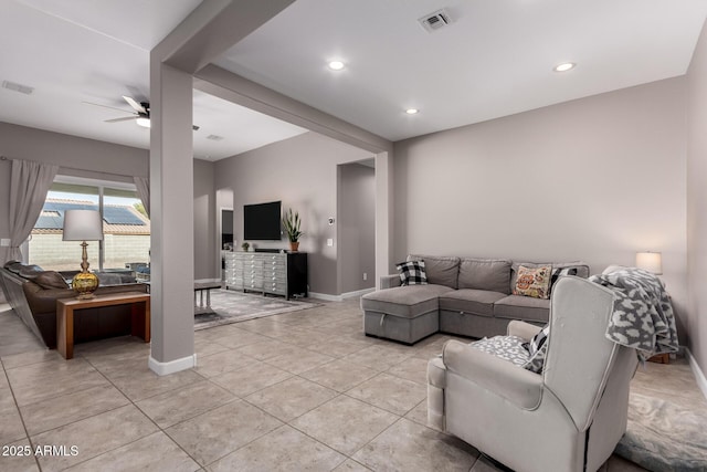 living area with baseboards, visible vents, light tile patterned flooring, recessed lighting, and ceiling fan