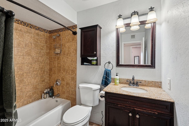 207 E Strahan Dr, Tempe, AZ 85283 - full bathroom with shower / bath combination, vanity, toilet, and a textured wall