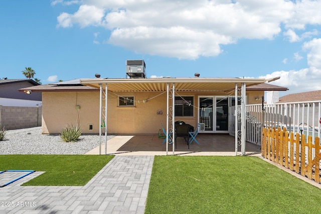 207 E Strahan Dr, Tempe, AZ 85283 - back of house featuring stucco siding and a patio area